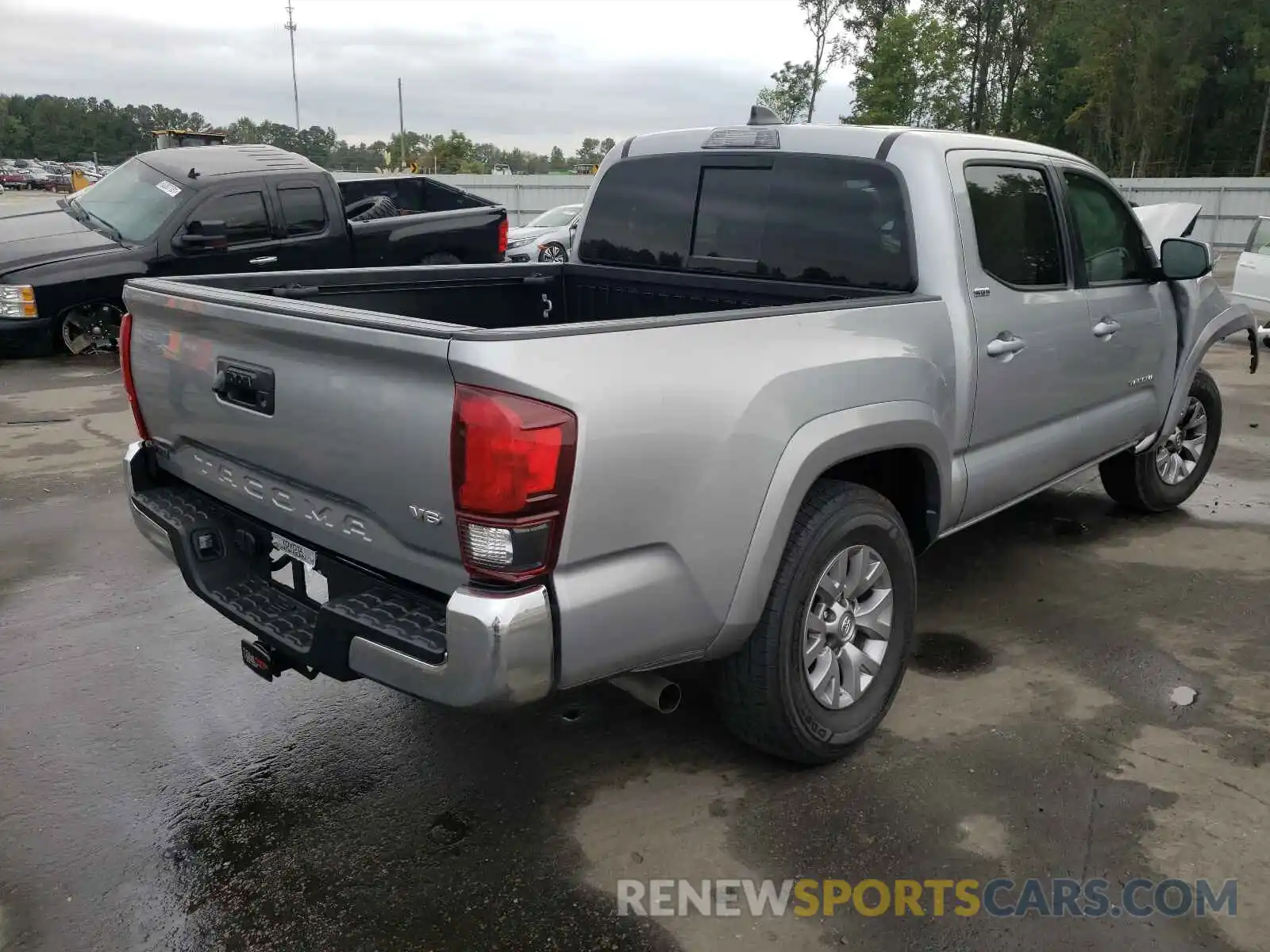 4 Photograph of a damaged car 5TFAZ5CN8MX116977 TOYOTA TACOMA 2021