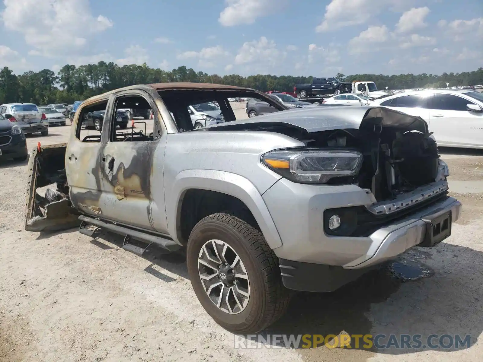 1 Photograph of a damaged car 5TFAZ5CN9MX099199 TOYOTA TACOMA 2021