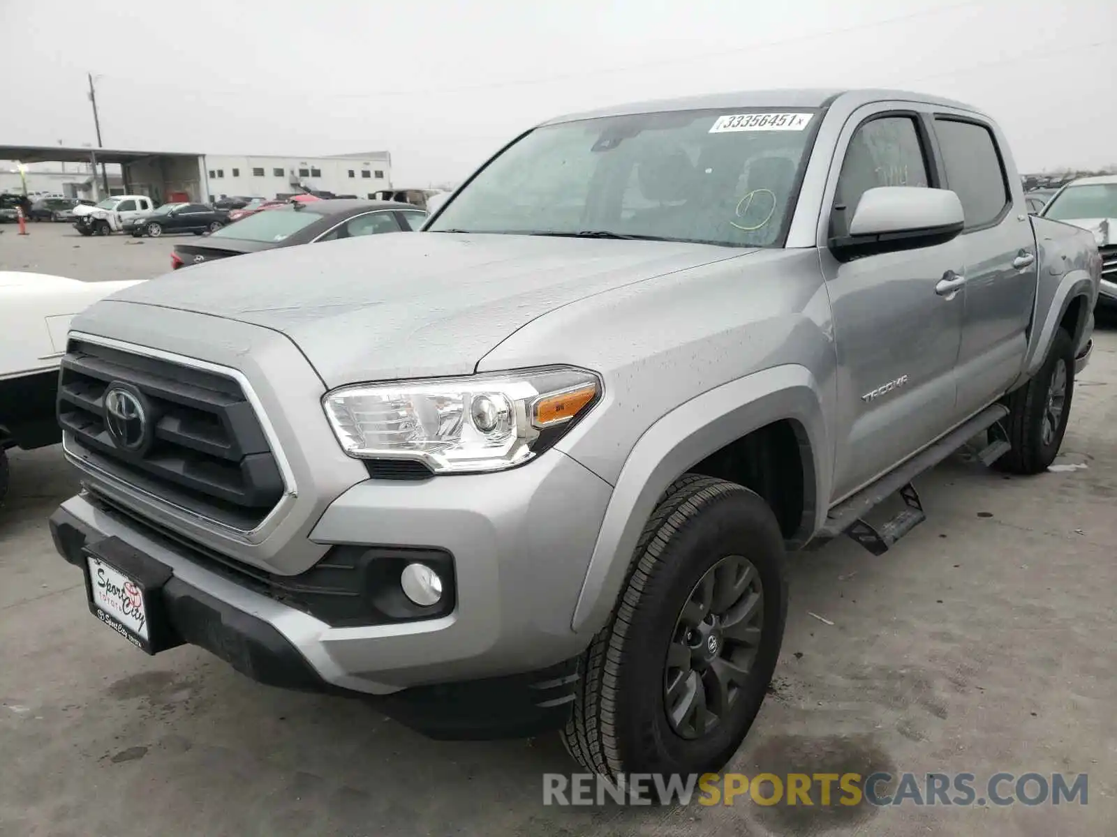 2 Photograph of a damaged car 5TFAZ5CN9MX099588 TOYOTA TACOMA 2021