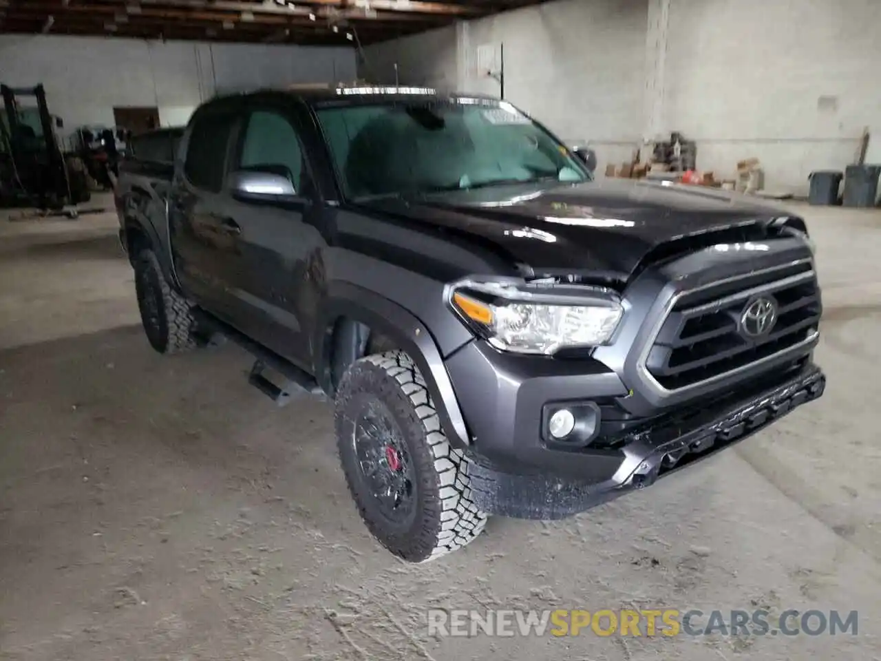 1 Photograph of a damaged car 5TFAZ5CN9MX099610 TOYOTA TACOMA 2021