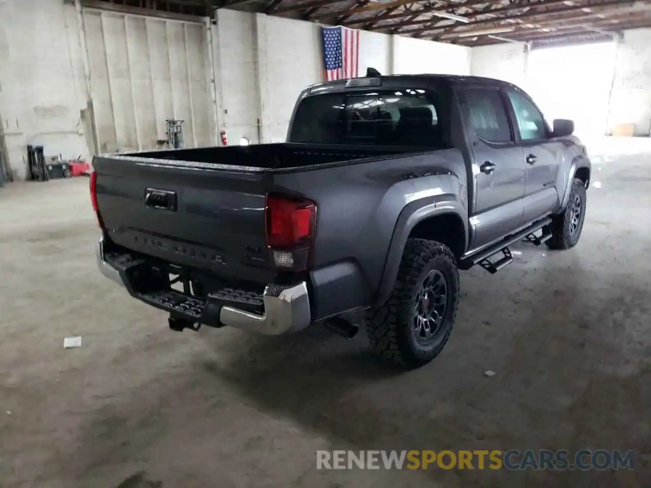 4 Photograph of a damaged car 5TFAZ5CN9MX099610 TOYOTA TACOMA 2021