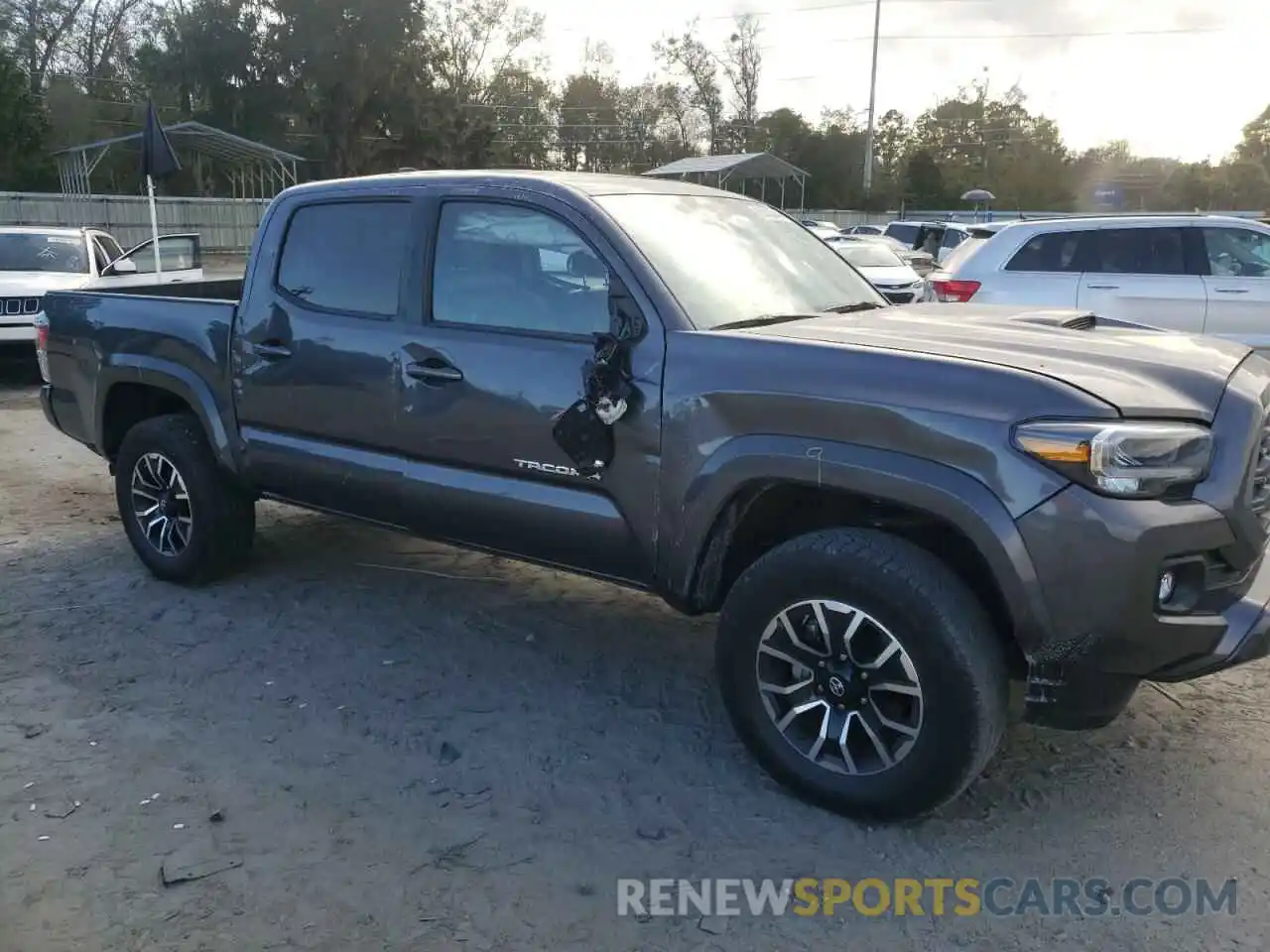 10 Photograph of a damaged car 5TFAZ5CN9MX100786 TOYOTA TACOMA 2021