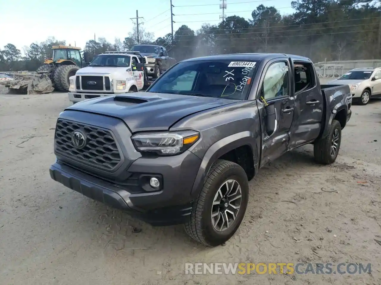 2 Photograph of a damaged car 5TFAZ5CN9MX100786 TOYOTA TACOMA 2021