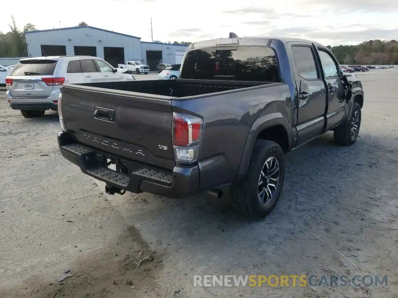 4 Photograph of a damaged car 5TFAZ5CN9MX100786 TOYOTA TACOMA 2021