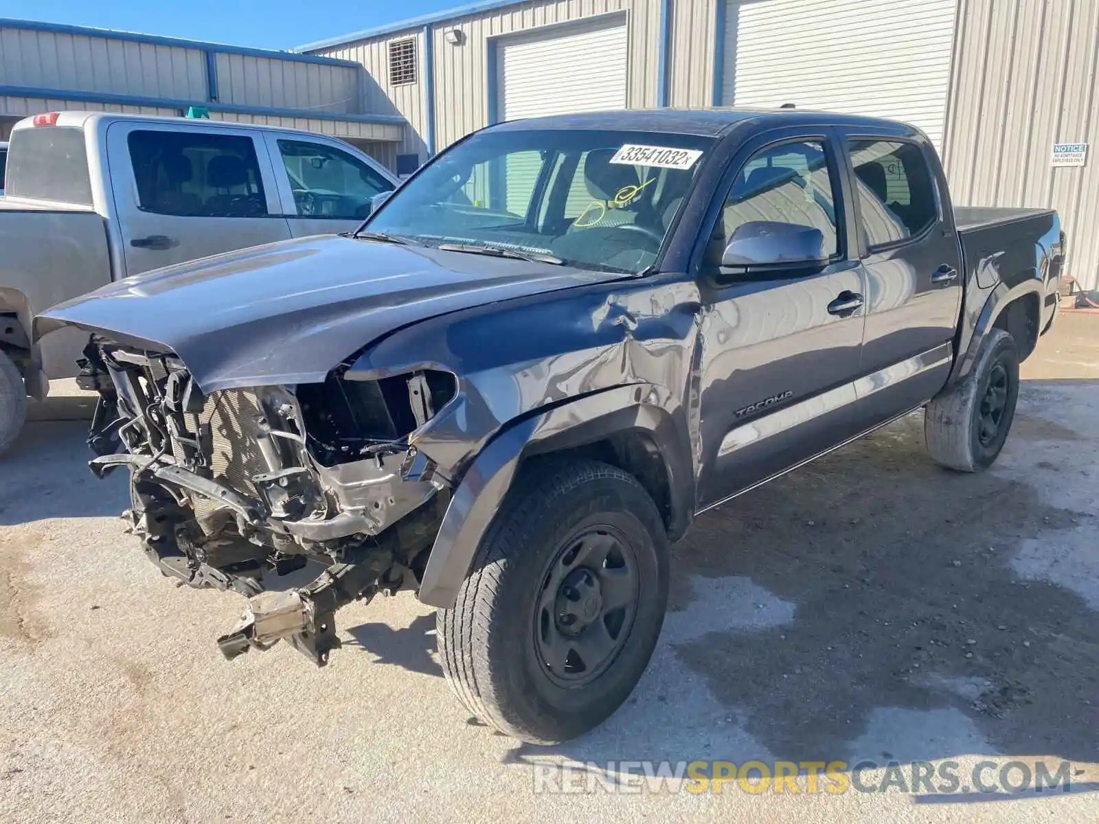 2 Photograph of a damaged car 5TFAZ5CN9MX105762 TOYOTA TACOMA 2021