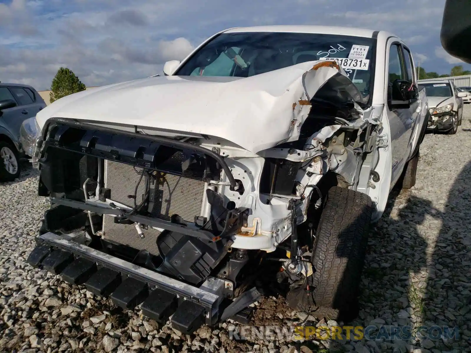 2 Photograph of a damaged car 5TFAZ5CN9MX109388 TOYOTA TACOMA 2021