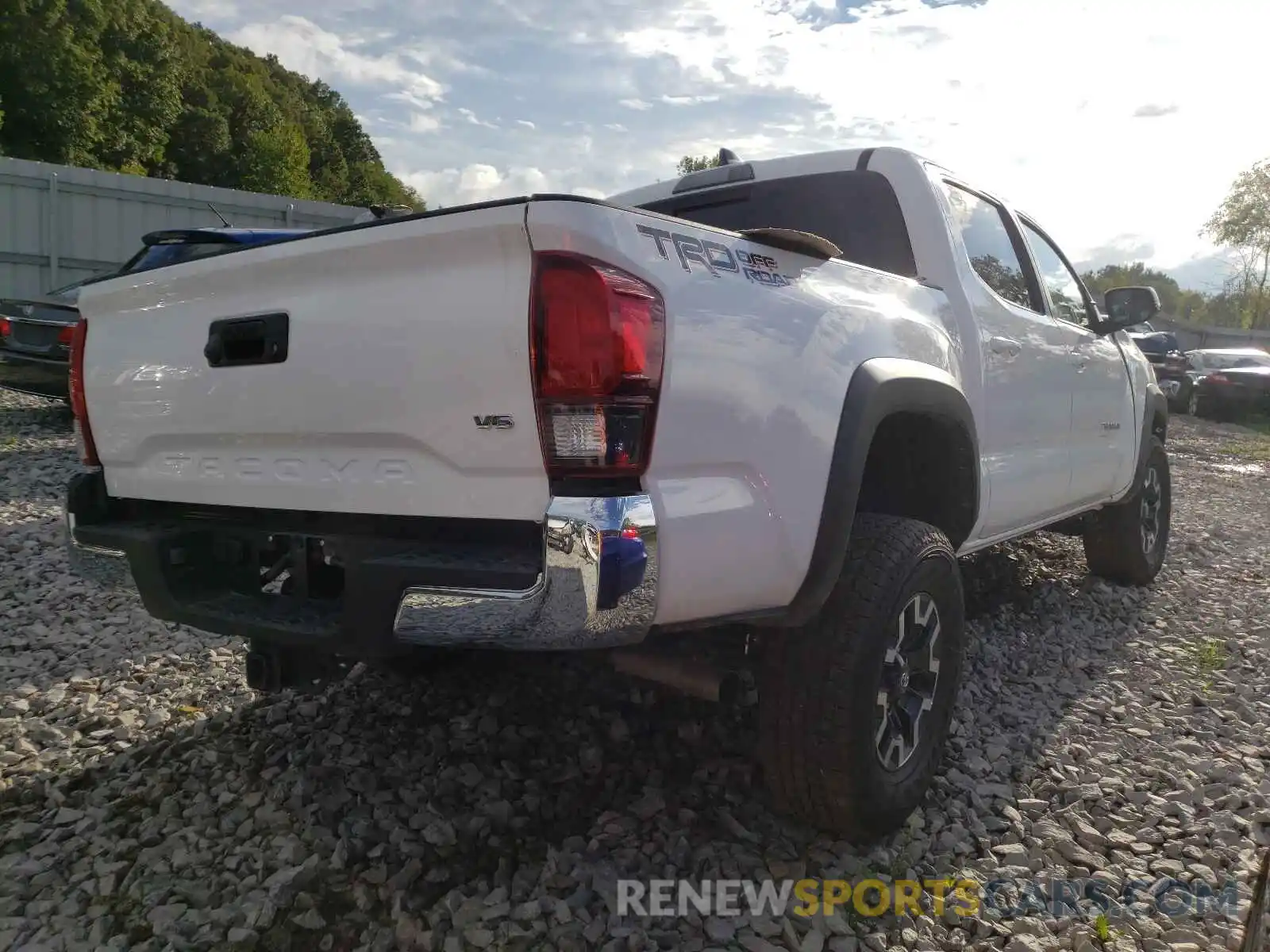 4 Photograph of a damaged car 5TFAZ5CN9MX109388 TOYOTA TACOMA 2021