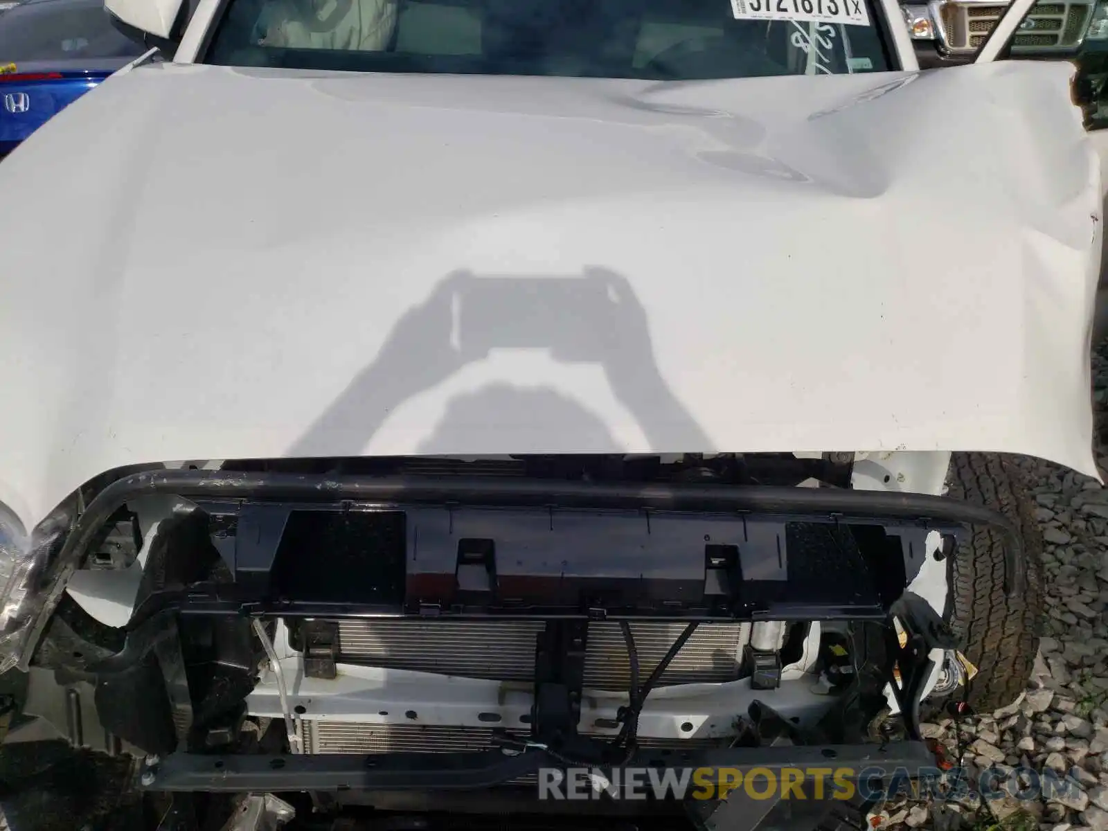 7 Photograph of a damaged car 5TFAZ5CN9MX109388 TOYOTA TACOMA 2021