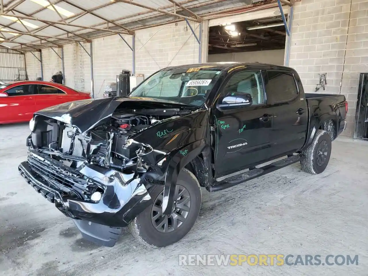 2 Photograph of a damaged car 5TFAZ5CNXMX099387 TOYOTA TACOMA 2021