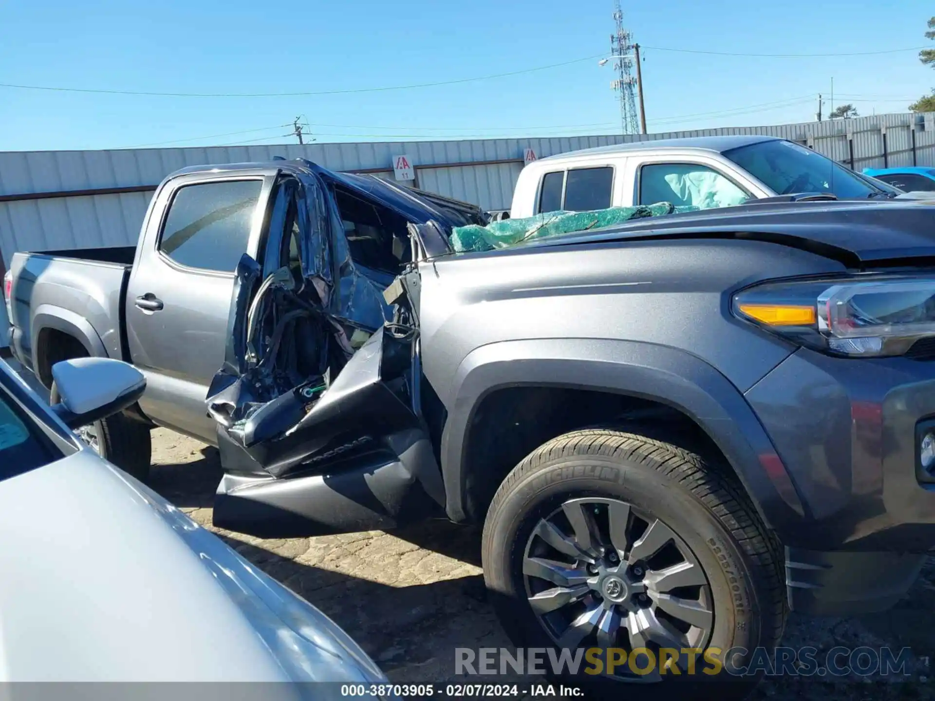 12 Photograph of a damaged car 5TFCZ5AN0MX244383 TOYOTA TACOMA 2021