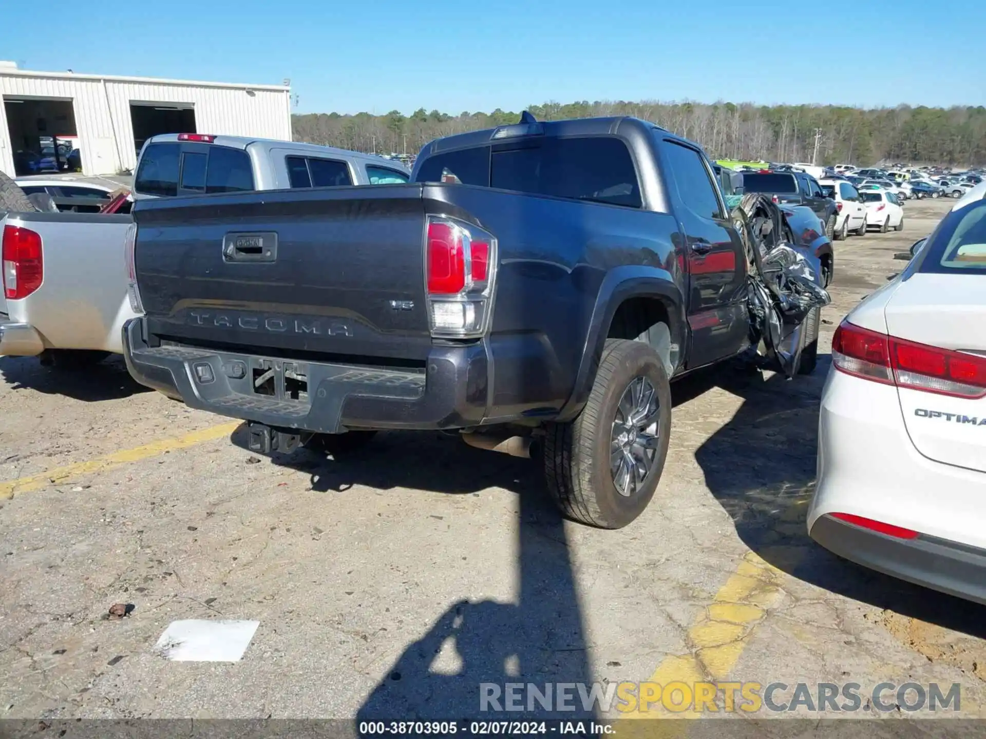 4 Photograph of a damaged car 5TFCZ5AN0MX244383 TOYOTA TACOMA 2021