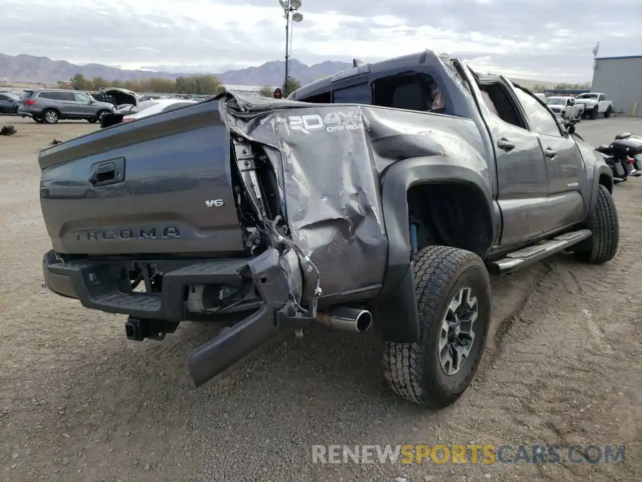 4 Photograph of a damaged car 5TFCZ5AN0MX245176 TOYOTA TACOMA 2021