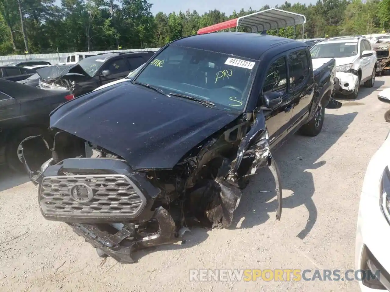 2 Photograph of a damaged car 5TFCZ5AN0MX255531 TOYOTA TACOMA 2021