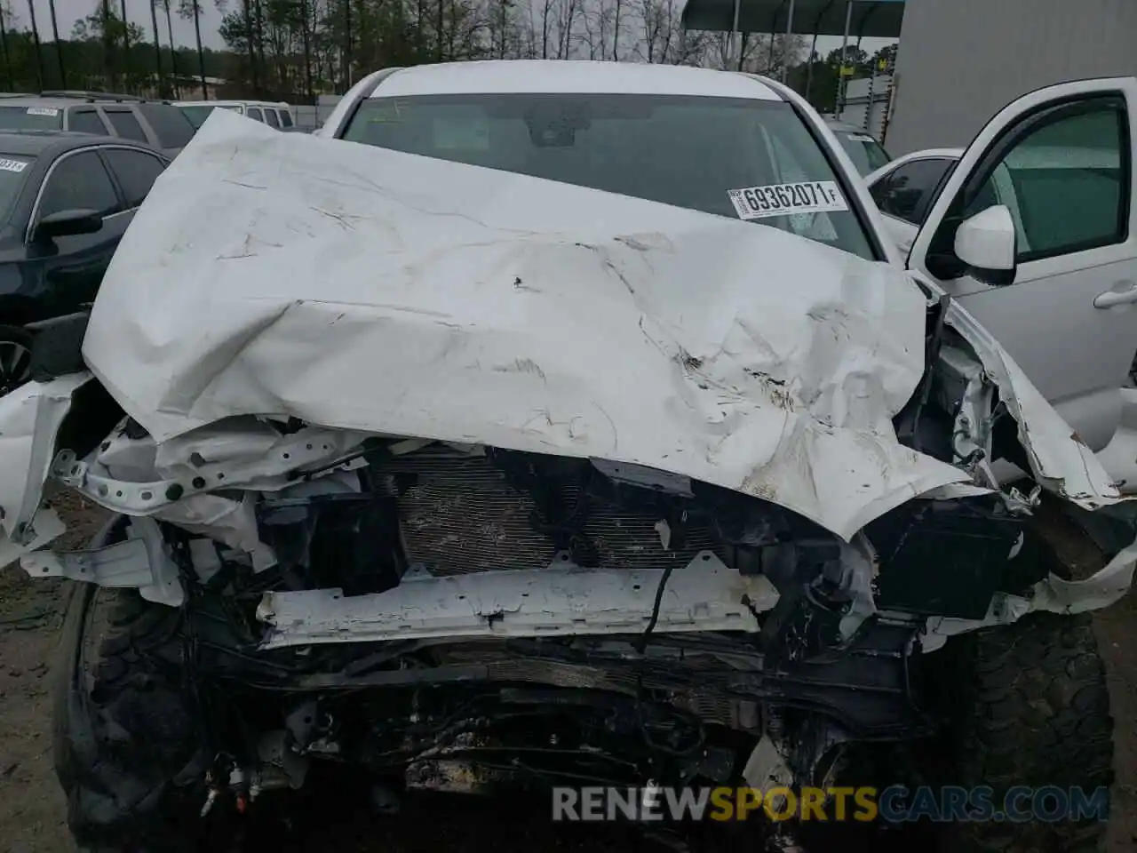 7 Photograph of a damaged car 5TFCZ5AN0MX257926 TOYOTA TACOMA 2021