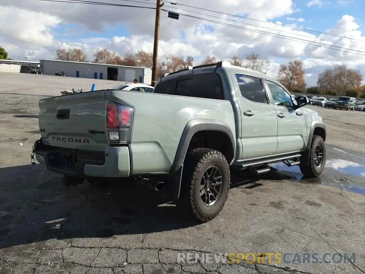 4 Photograph of a damaged car 5TFCZ5AN0MX265251 TOYOTA TACOMA 2021