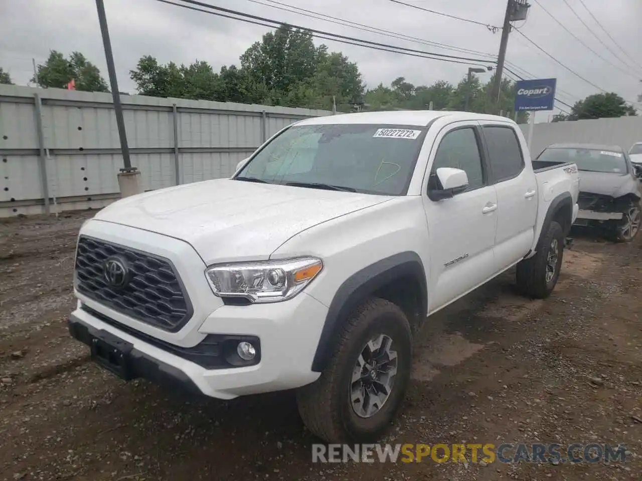 2 Photograph of a damaged car 5TFCZ5AN0MX265623 TOYOTA TACOMA 2021