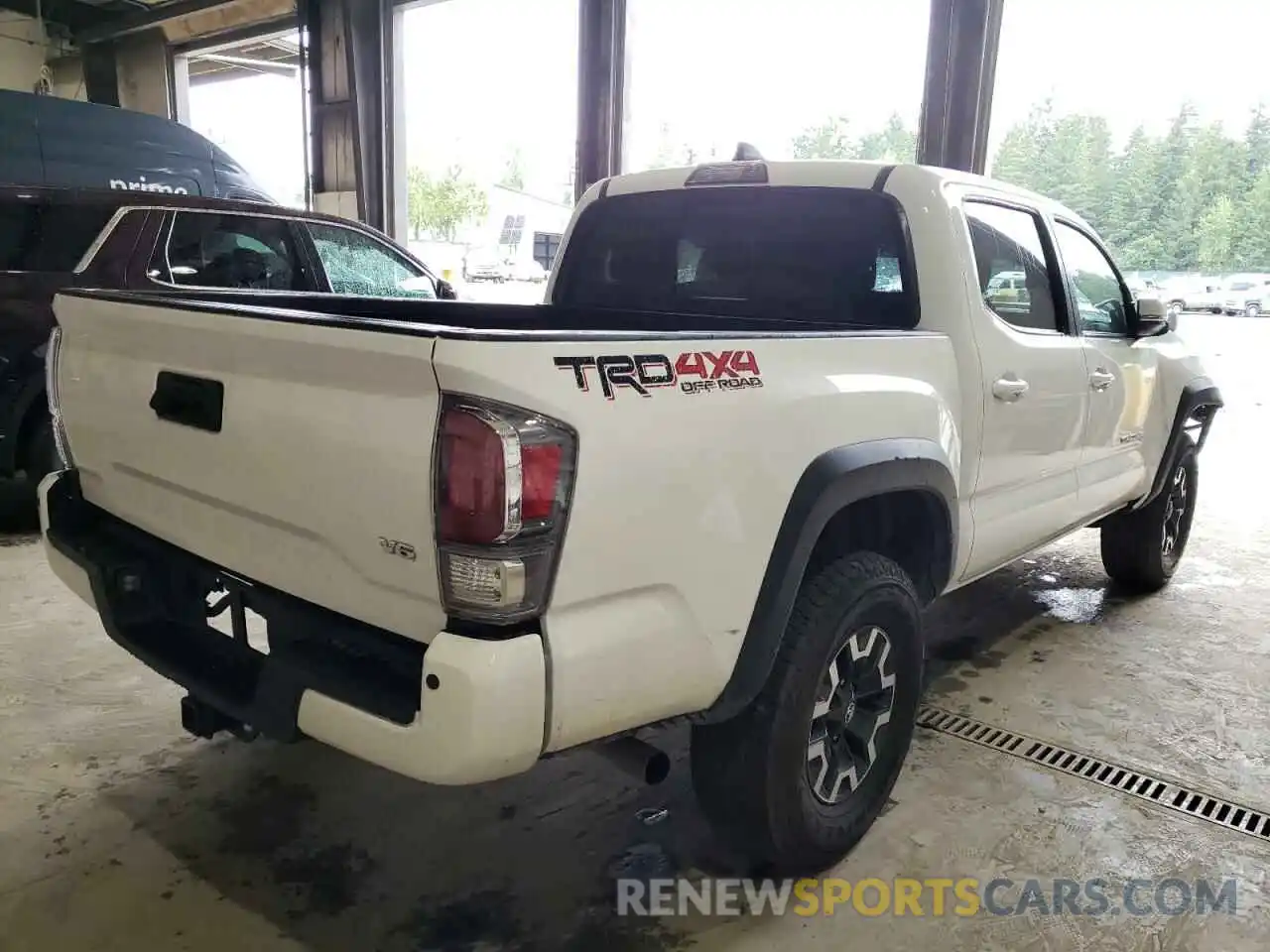 4 Photograph of a damaged car 5TFCZ5AN0MX268179 TOYOTA TACOMA 2021