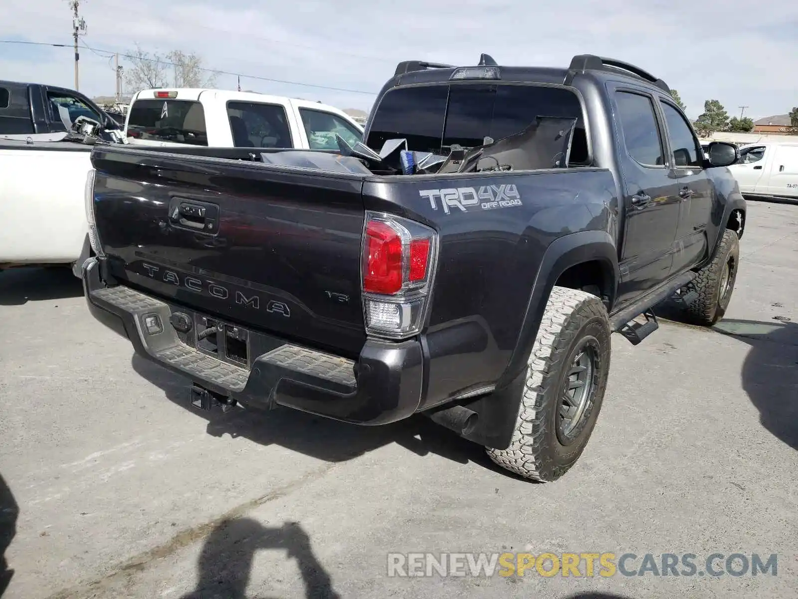 4 Photograph of a damaged car 5TFCZ5AN1MX247728 TOYOTA TACOMA 2021