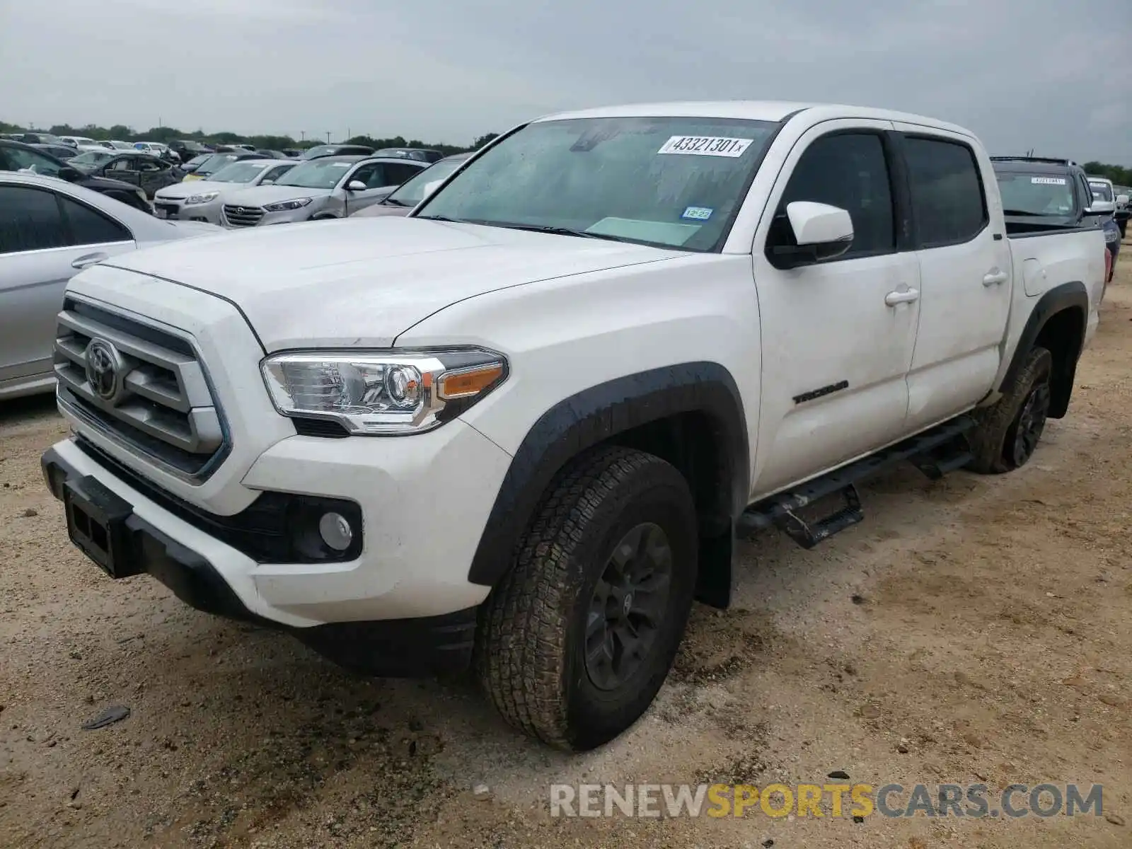 2 Photograph of a damaged car 5TFCZ5AN1MX252489 TOYOTA TACOMA 2021