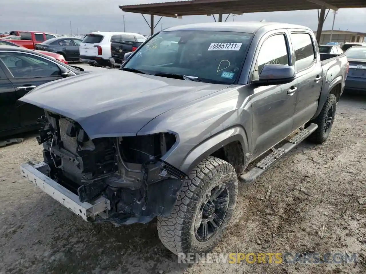 2 Photograph of a damaged car 5TFCZ5AN1MX253979 TOYOTA TACOMA 2021