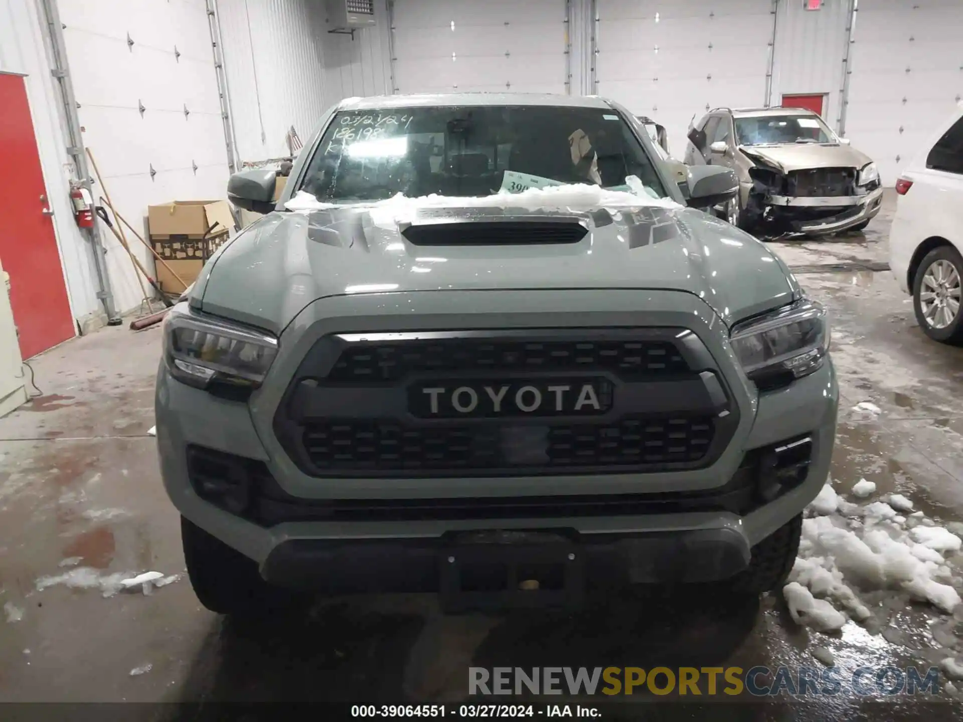 12 Photograph of a damaged car 5TFCZ5AN1MX262827 TOYOTA TACOMA 2021