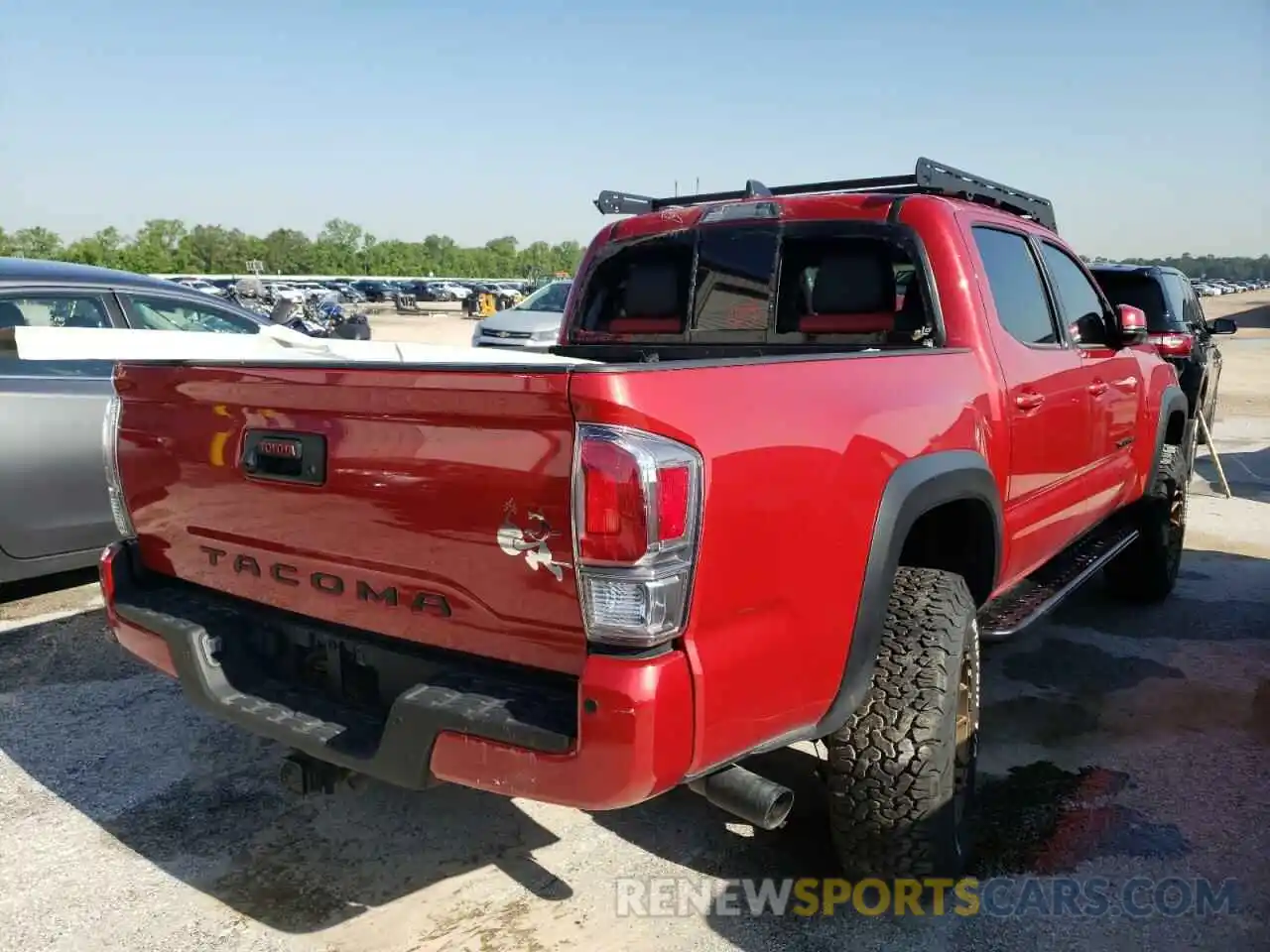 4 Photograph of a damaged car 5TFCZ5AN2MX245504 TOYOTA TACOMA 2021