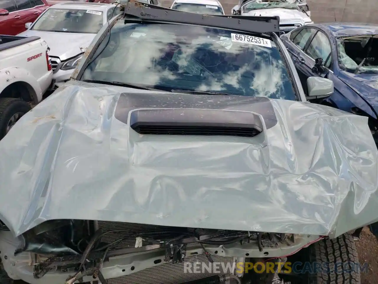 7 Photograph of a damaged car 5TFCZ5AN2MX245678 TOYOTA TACOMA 2021