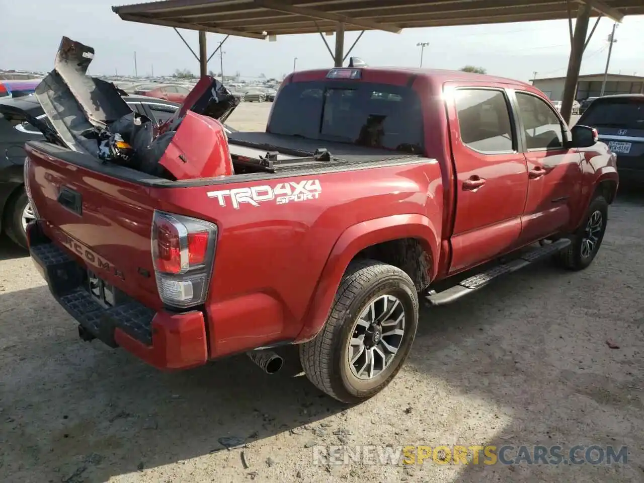 4 Photograph of a damaged car 5TFCZ5AN2MX253389 TOYOTA TACOMA 2021