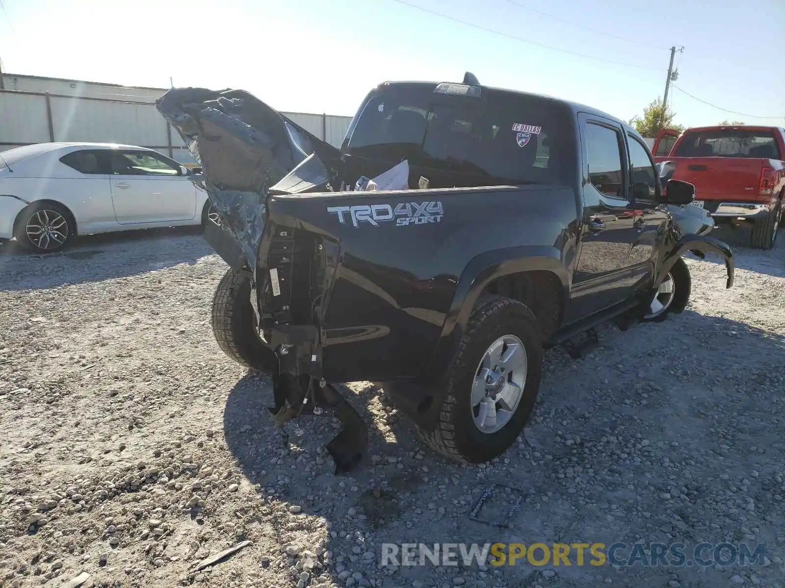 4 Photograph of a damaged car 5TFCZ5AN2MX267423 TOYOTA TACOMA 2021