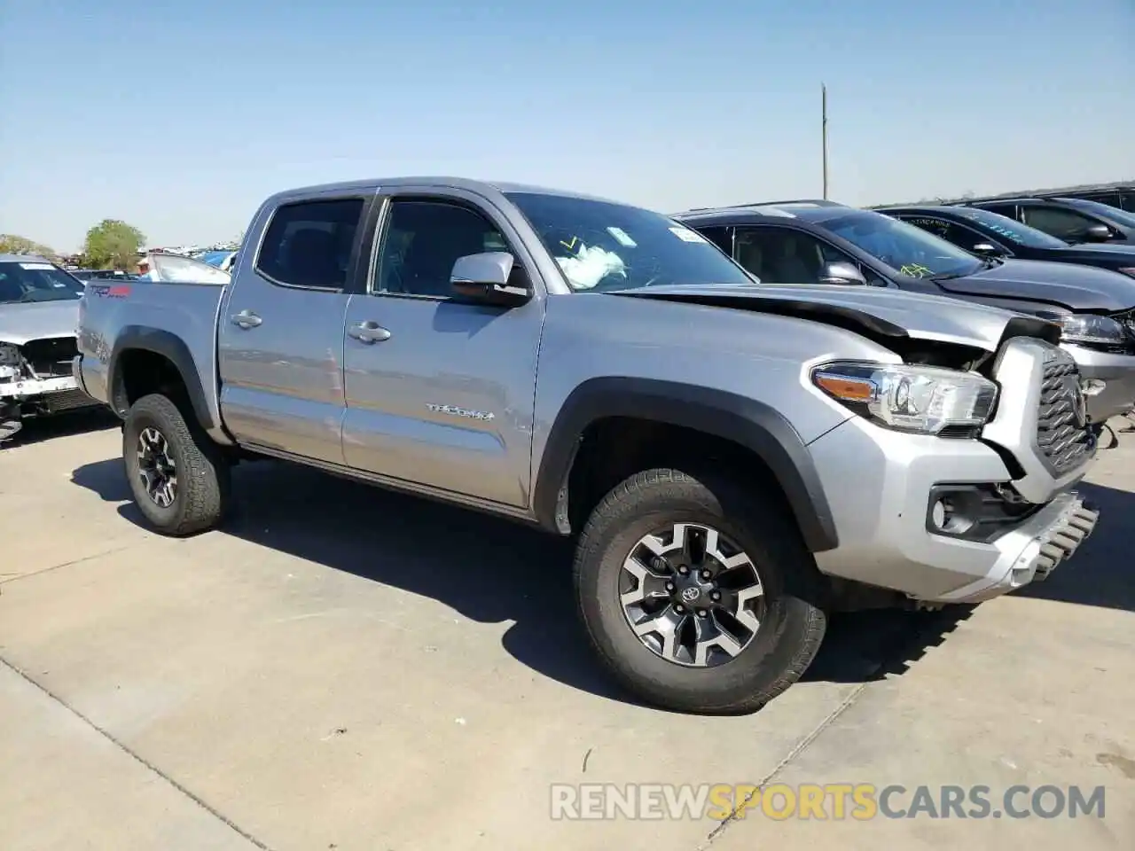 4 Photograph of a damaged car 5TFCZ5AN2MX268877 TOYOTA TACOMA 2021