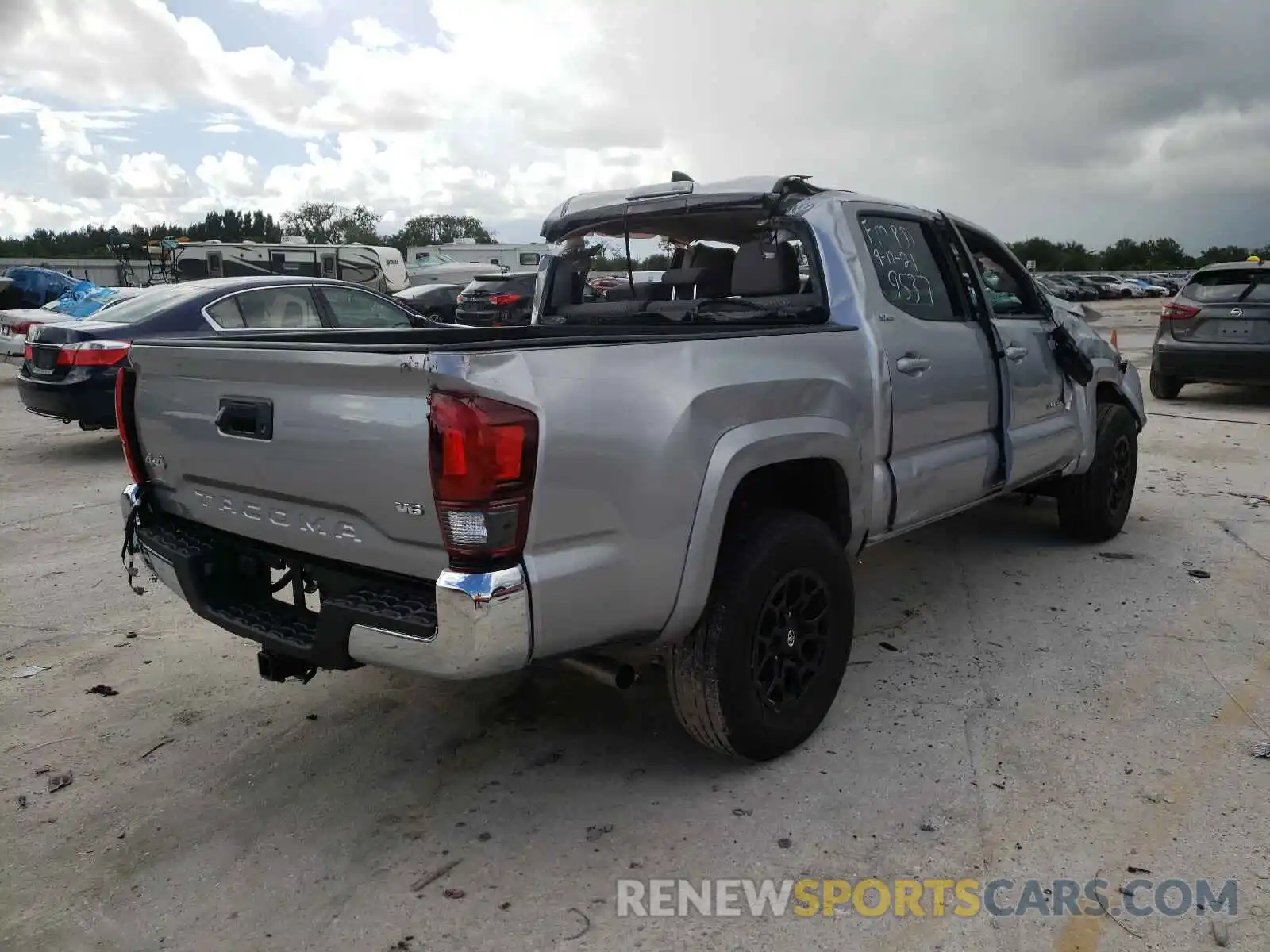 4 Photograph of a damaged car 5TFCZ5AN2MX281807 TOYOTA TACOMA 2021