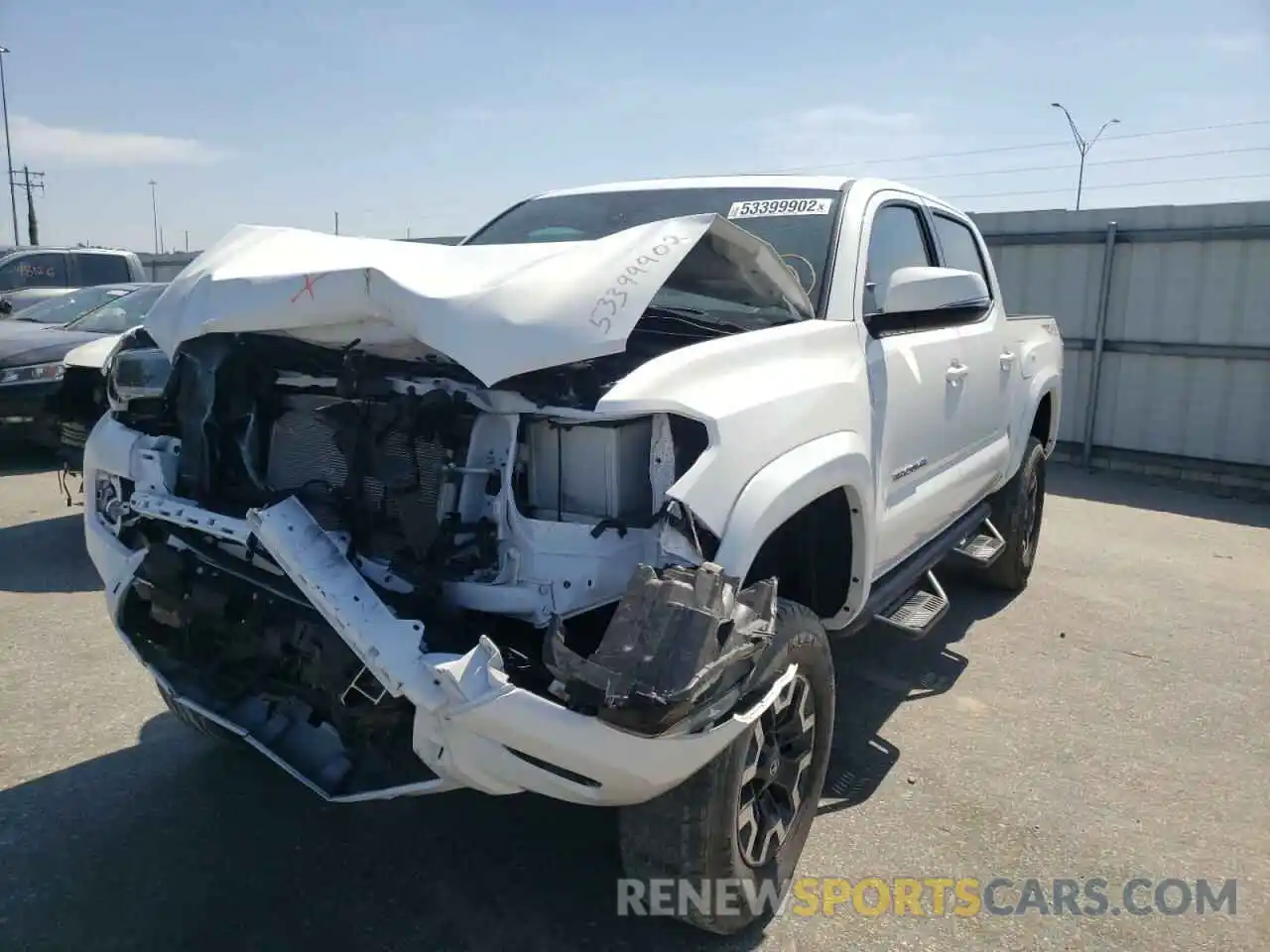 2 Photograph of a damaged car 5TFCZ5AN3MX246872 TOYOTA TACOMA 2021