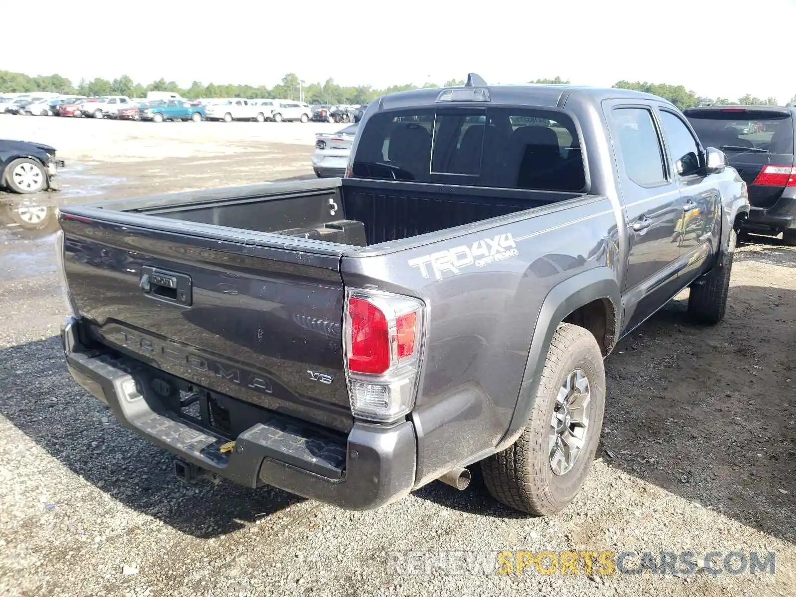 4 Photograph of a damaged car 5TFCZ5AN3MX273053 TOYOTA TACOMA 2021