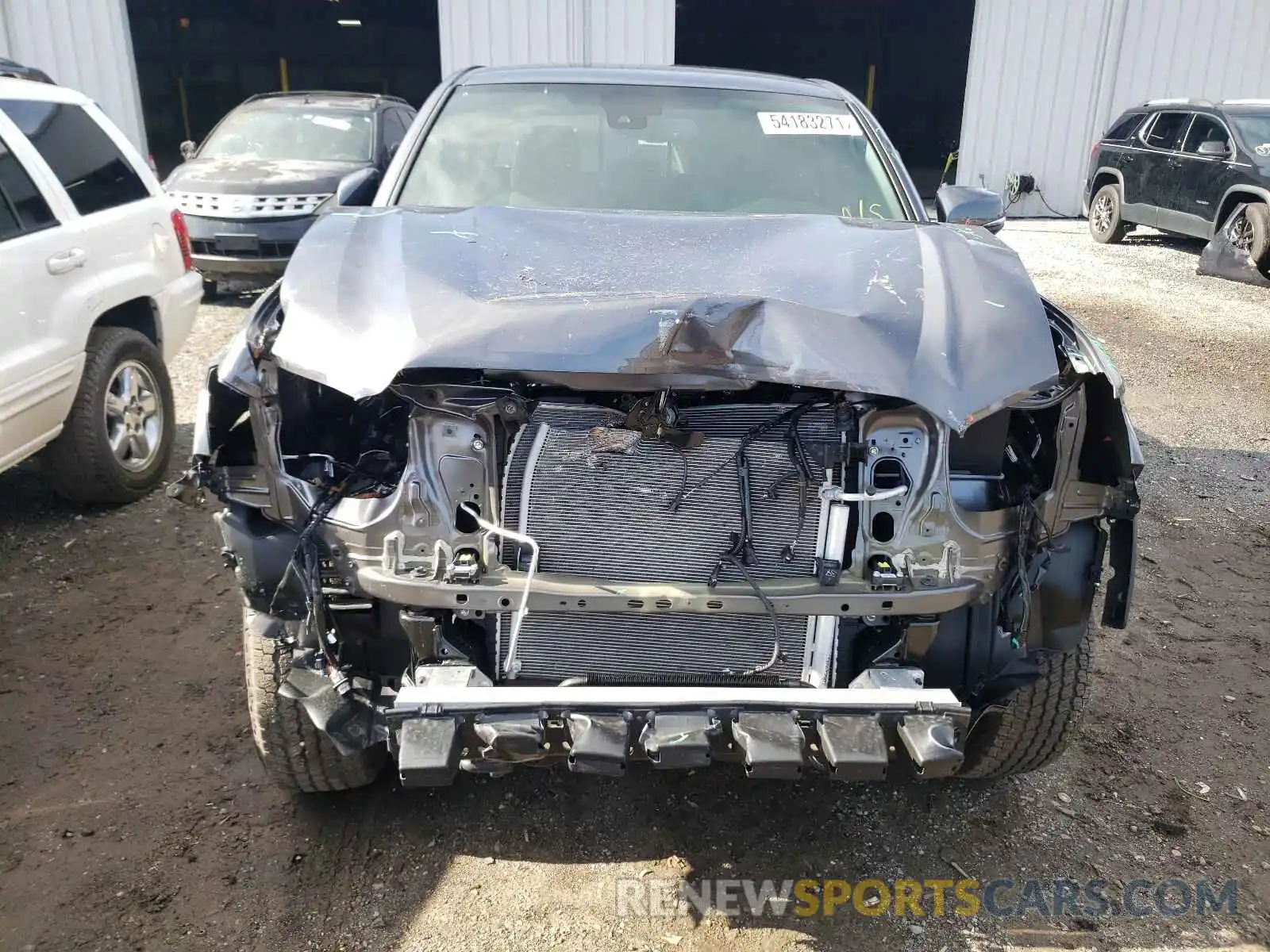 9 Photograph of a damaged car 5TFCZ5AN3MX273053 TOYOTA TACOMA 2021