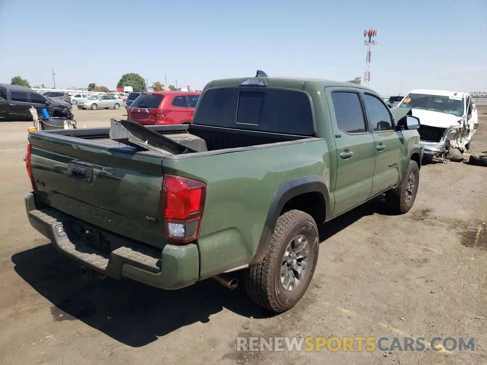 4 Photograph of a damaged car 5TFCZ5AN3MX273232 TOYOTA TACOMA 2021