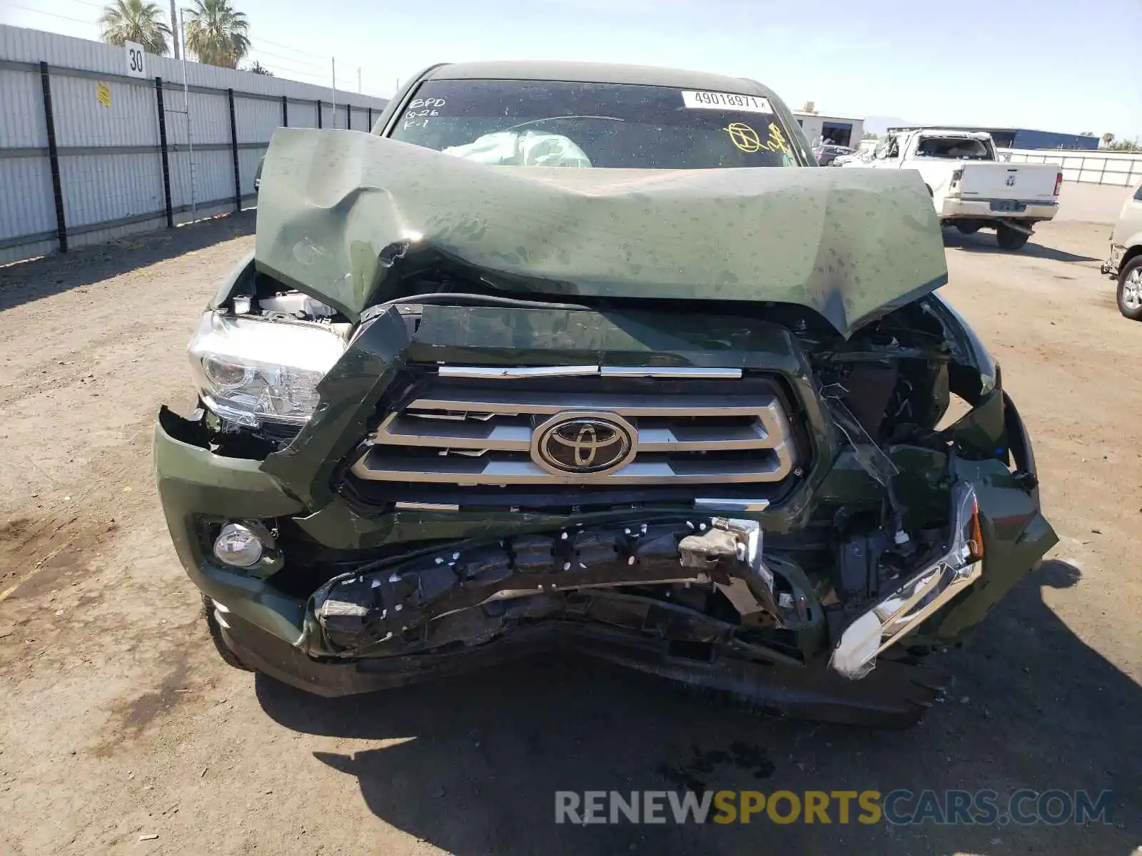 9 Photograph of a damaged car 5TFCZ5AN3MX273232 TOYOTA TACOMA 2021