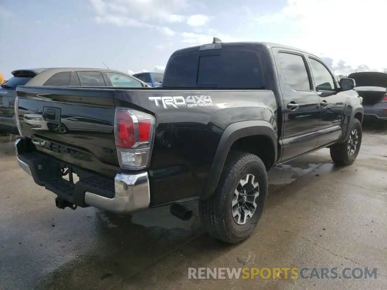 4 Photograph of a damaged car 5TFCZ5AN4MX248601 TOYOTA TACOMA 2021