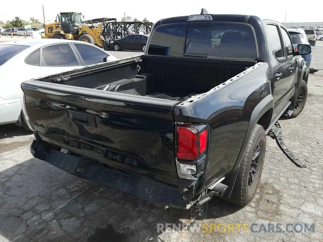 4 Photograph of a damaged car 5TFCZ5AN4MX250915 TOYOTA TACOMA 2021