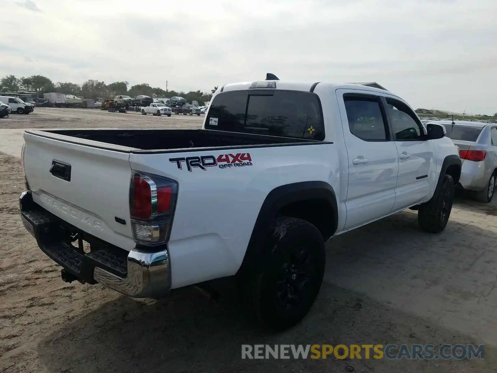 4 Photograph of a damaged car 5TFCZ5AN4MX254107 TOYOTA TACOMA 2021