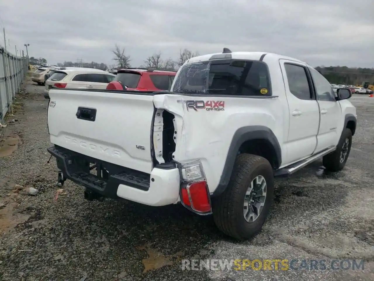 4 Photograph of a damaged car 5TFCZ5AN4MX255239 TOYOTA TACOMA 2021