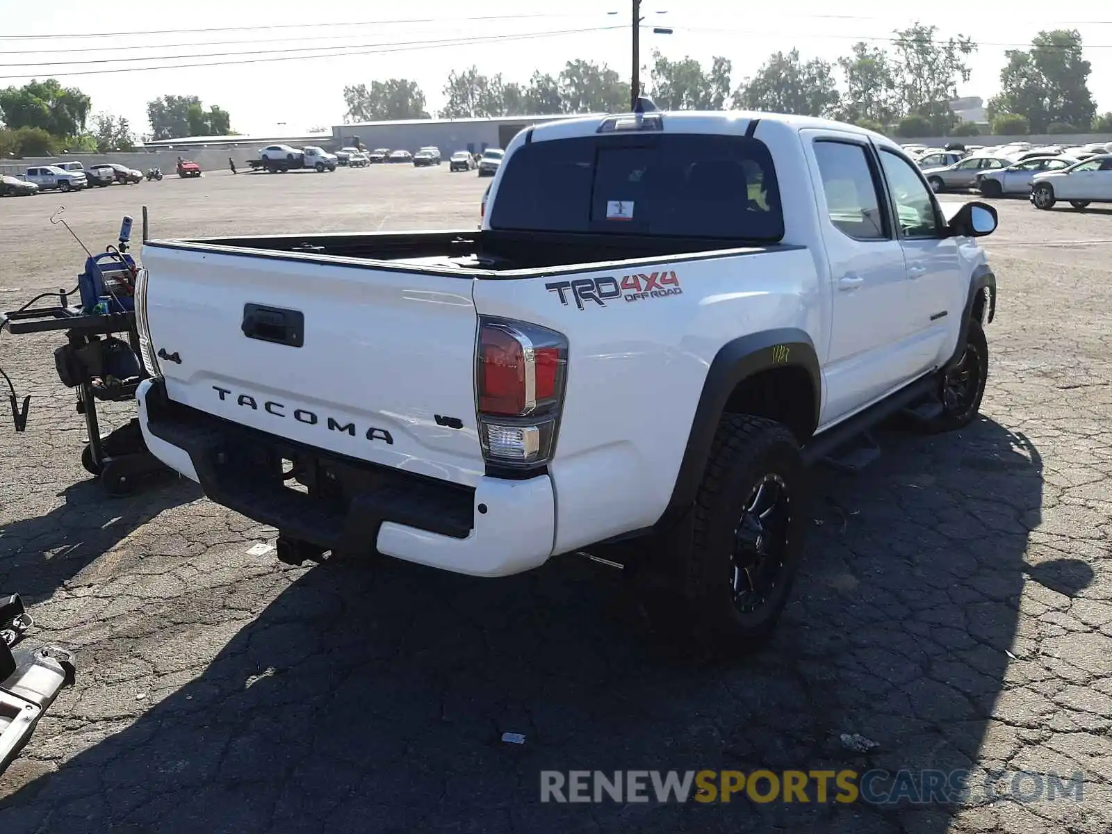 4 Photograph of a damaged car 5TFCZ5AN4MX265964 TOYOTA TACOMA 2021