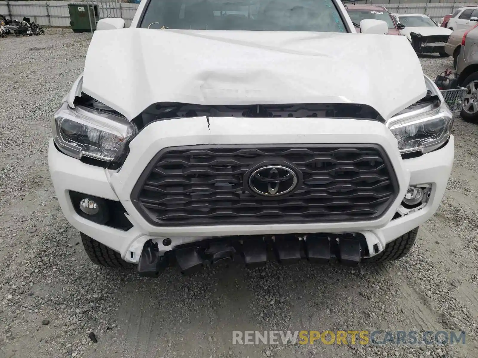 7 Photograph of a damaged car 5TFCZ5AN4MX271084 TOYOTA TACOMA 2021