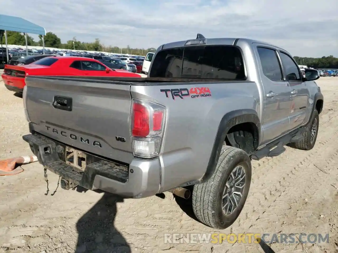 4 Photograph of a damaged car 5TFCZ5AN4MX273014 TOYOTA TACOMA 2021