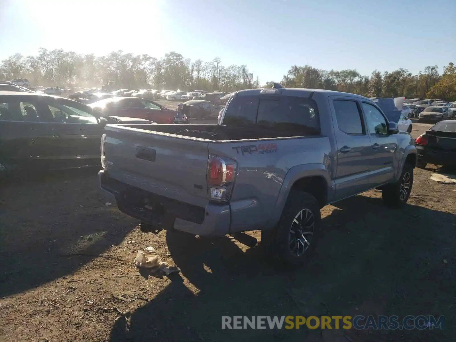 4 Photograph of a damaged car 5TFCZ5AN5MX244878 TOYOTA TACOMA 2021