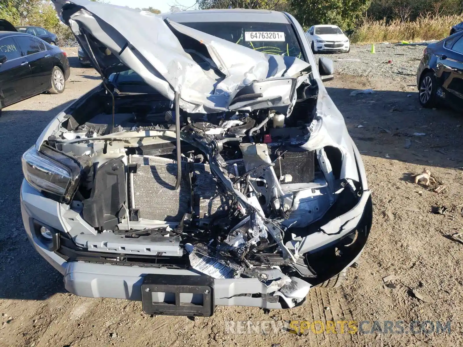 9 Photograph of a damaged car 5TFCZ5AN5MX244878 TOYOTA TACOMA 2021