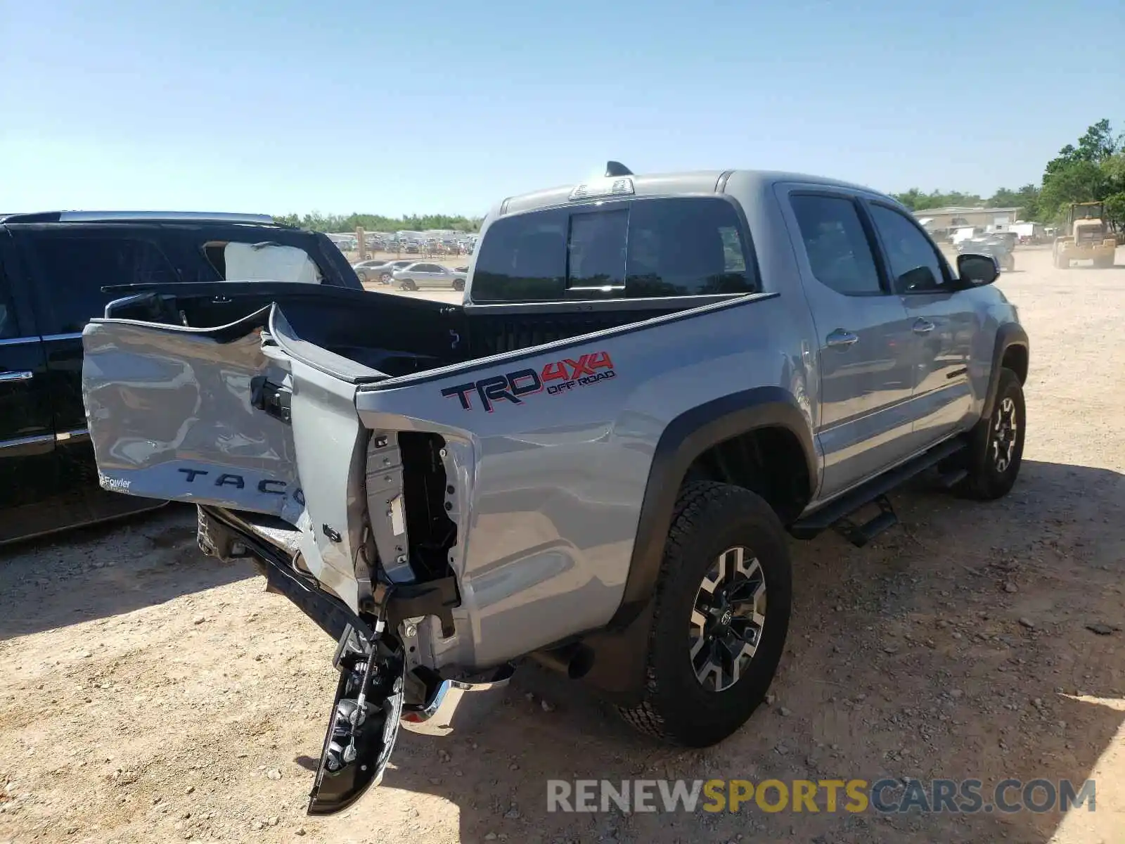 4 Photograph of a damaged car 5TFCZ5AN5MX246839 TOYOTA TACOMA 2021