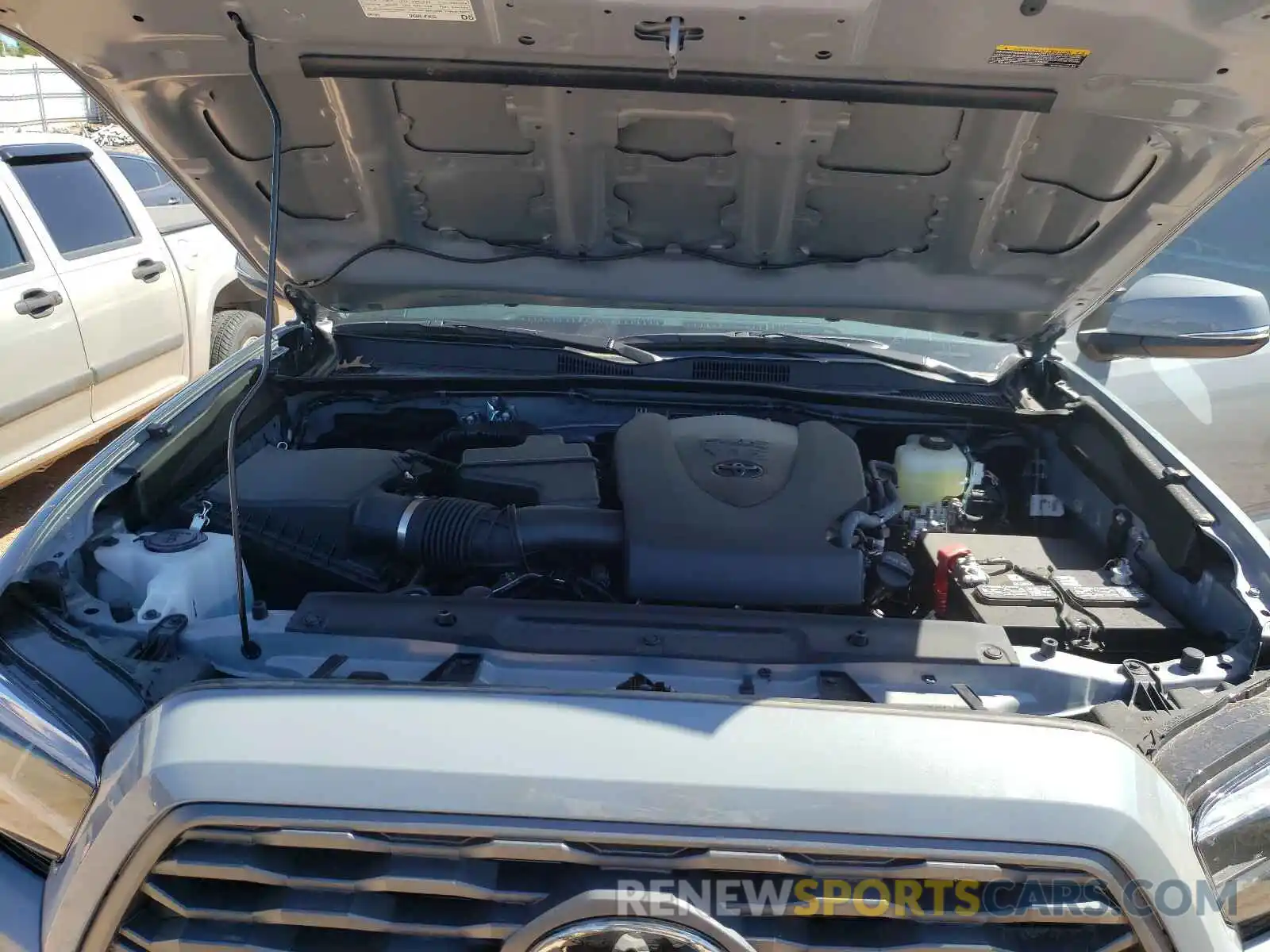 7 Photograph of a damaged car 5TFCZ5AN5MX246839 TOYOTA TACOMA 2021