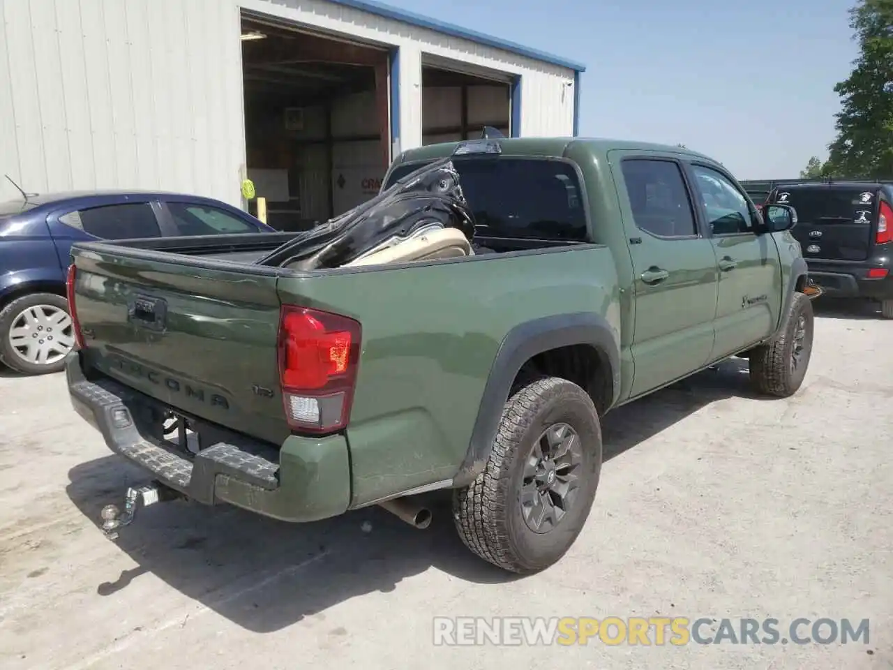 4 Photograph of a damaged car 5TFCZ5AN5MX248106 TOYOTA TACOMA 2021