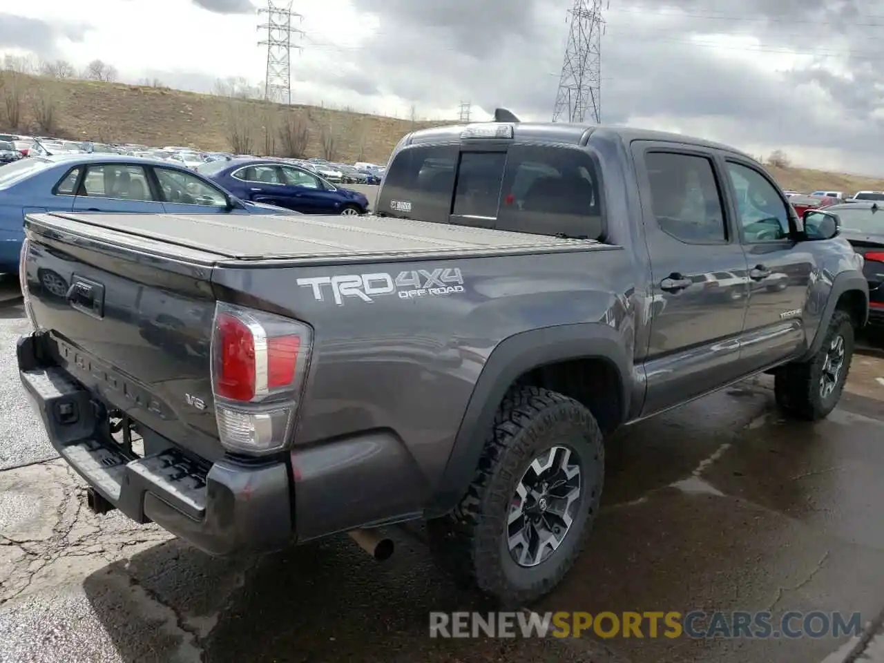 4 Photograph of a damaged car 5TFCZ5AN5MX252995 TOYOTA TACOMA 2021