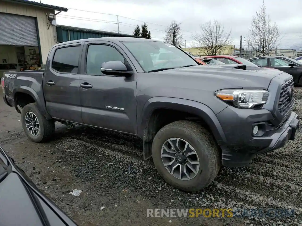 4 Photograph of a damaged car 5TFCZ5AN5MX265911 TOYOTA TACOMA 2021